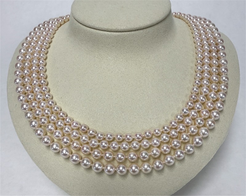 Edle Akoya Perlenkette 4-reihig, rund 5,0 - 7,0 mm AAA, 750er Gold